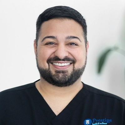 Portrait of Dr. Marino Kambourakis, DC, chiropractor at Prestige Health & Wellness Financial District
