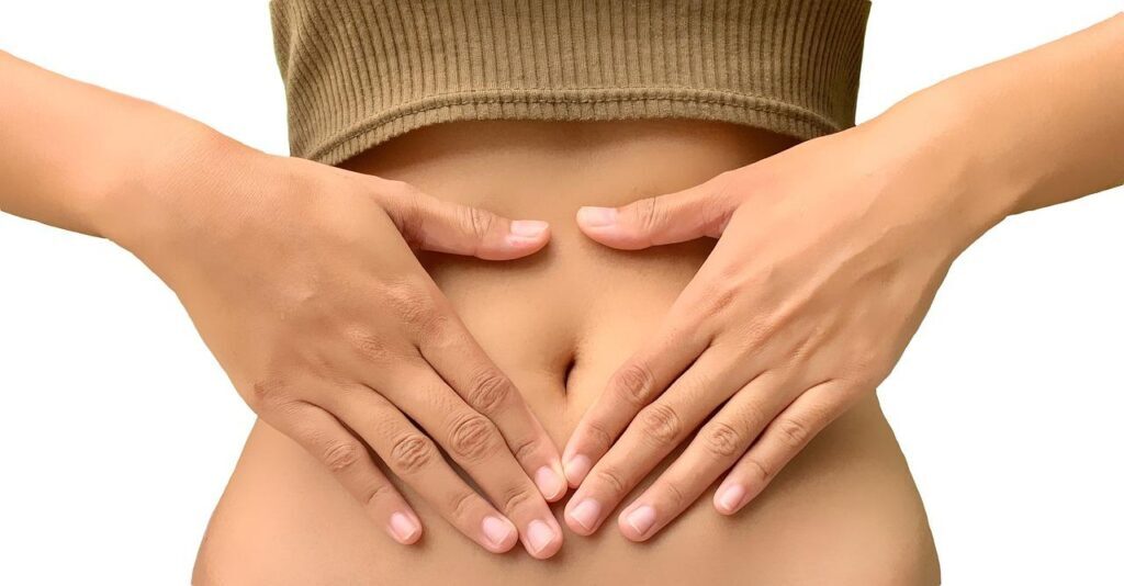 Hands on lower back indicating chiropractic care focus in Manhattan, NYC